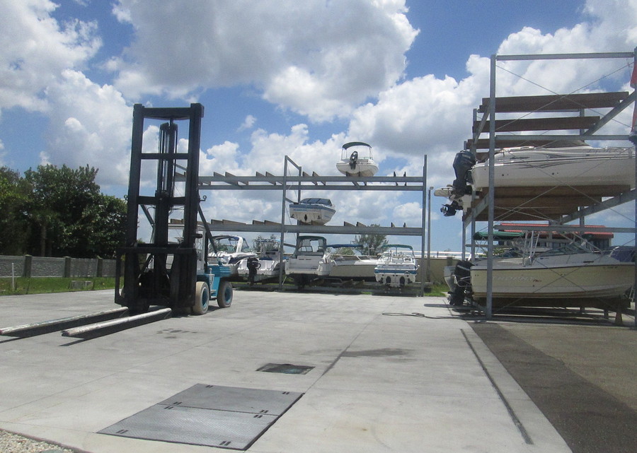 Everest Marina forklift beside outdoor dry rack boat storage